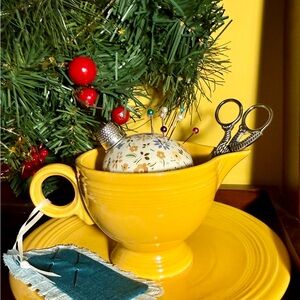 Sweet Yellow Pins and Needles Teacup Sewing Caddy featuring a snips spout